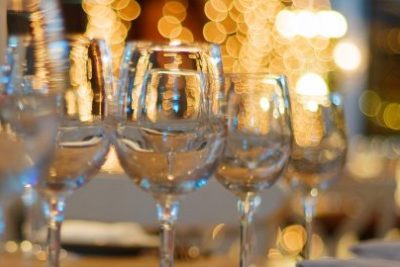 Dining-table-glasses-and-soft-focus-lights-web-page-604x270
